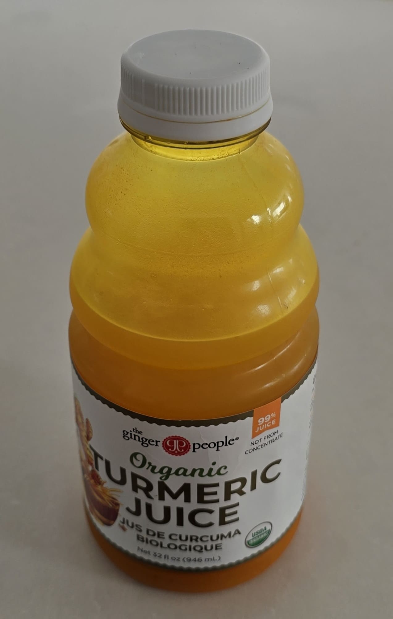 Plastic spice bottle stained by turmeric